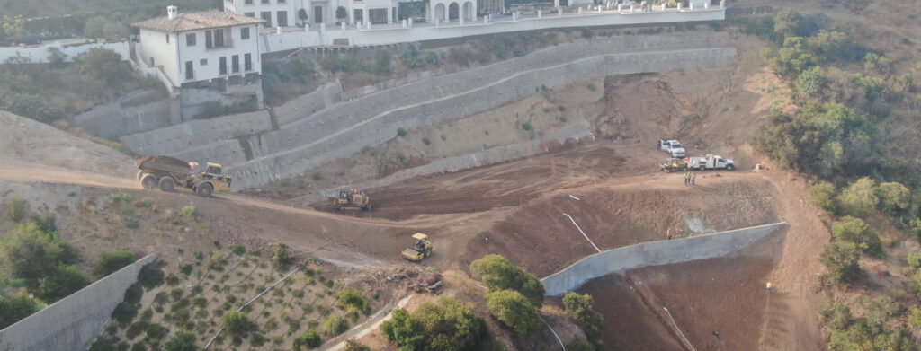 Design-build hillside stabilization and earthwork project with retaining walls