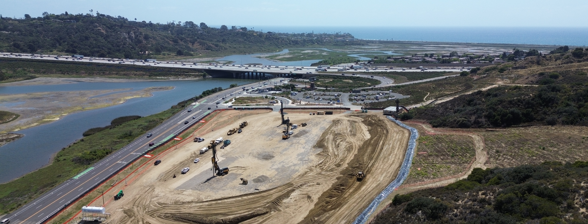 Belmont Village Encinitas construction site with drilling rigs and coastal project area