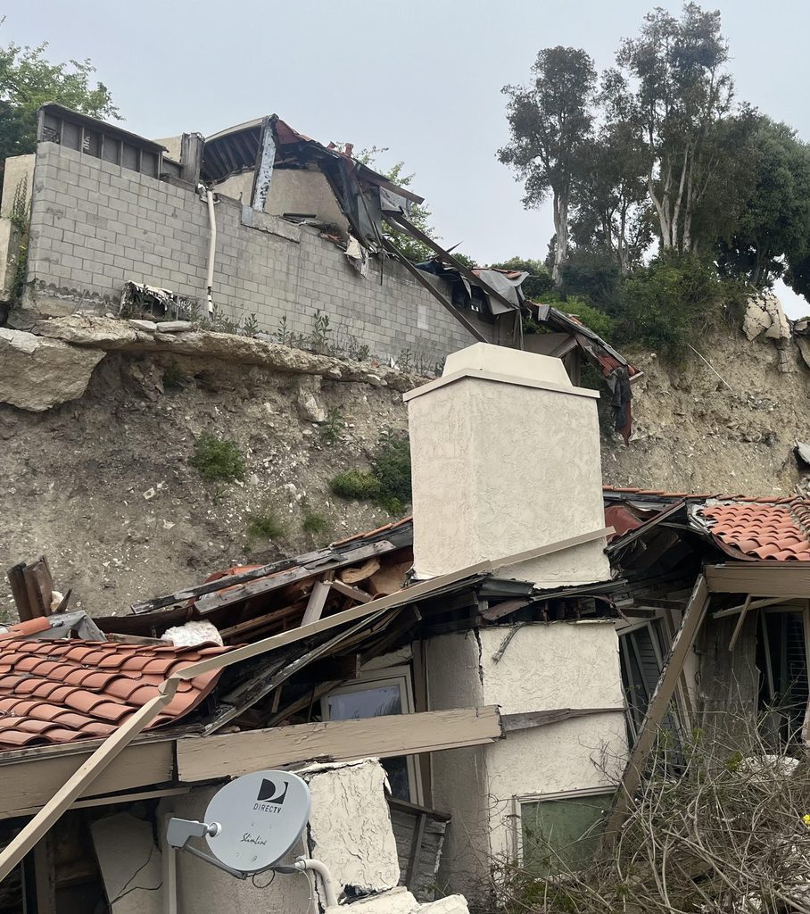 Homes that fell into the ravine below the slide.